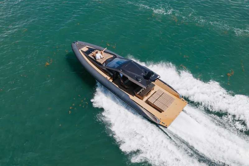 Slide: The Image of Aerial view of 2025 Anvera 48 luxury yacht cruising on open water. - 41