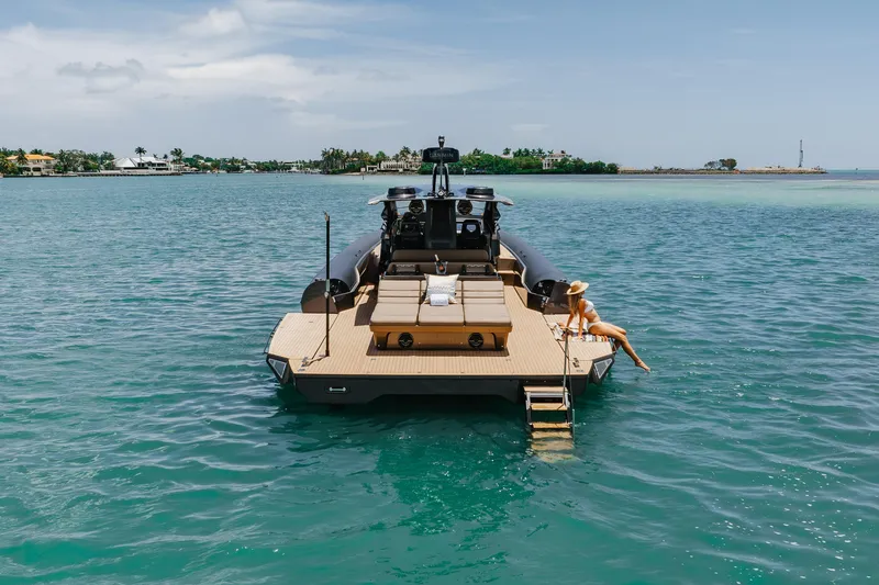 Slide: The Image of Luxury Anvera 48 yacht, 2025 model, anchored in serene turquoise waters. - 42