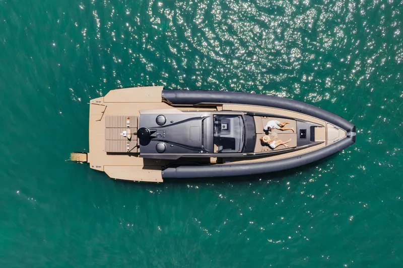 Slide: The Image of Aerial view of 2025 Anvera 48 luxury yacht on sparkling turquoise water. - 46