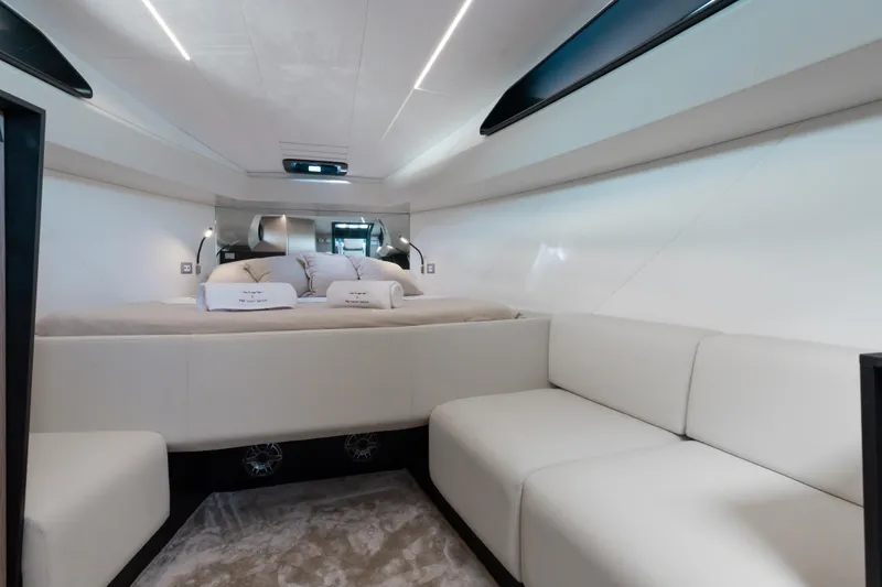 Slide: The Image of Luxurious interior of 2025 Anvera 48 yacht with modern white seating and bedding. - 5