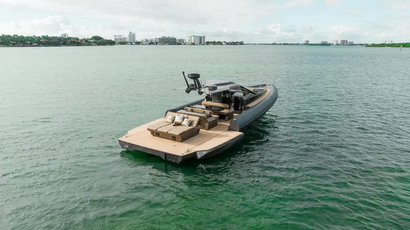 Slide: The Image of Luxury Anvera 48 yacht cruising on calm waters, 2025 model. - 6