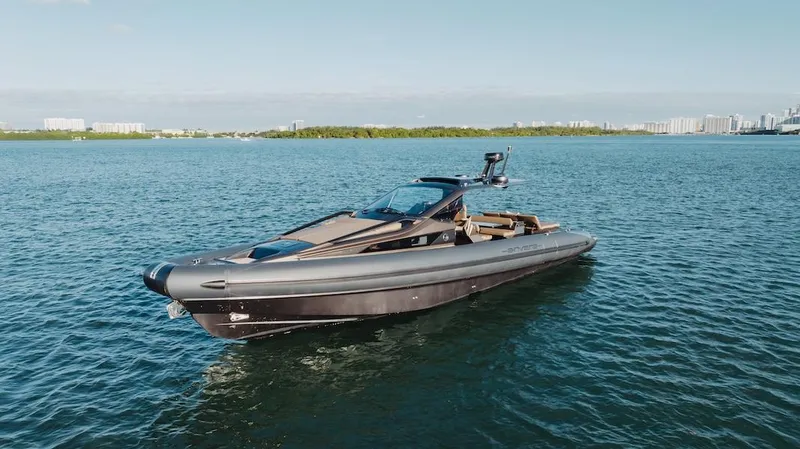 Slide: The Image of 2025 Anvera 48 luxury yacht on calm blue waters, showcasing sleek design and modern features. - 7