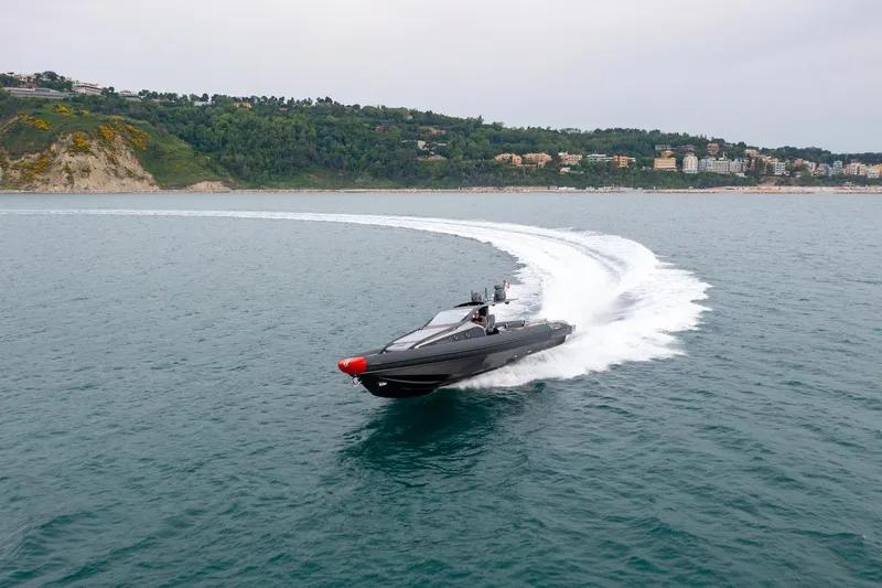 Slide: The Image of Anvera ANVERA 58 (2025) luxury yacht cruising on open water near a scenic coastline. - 16