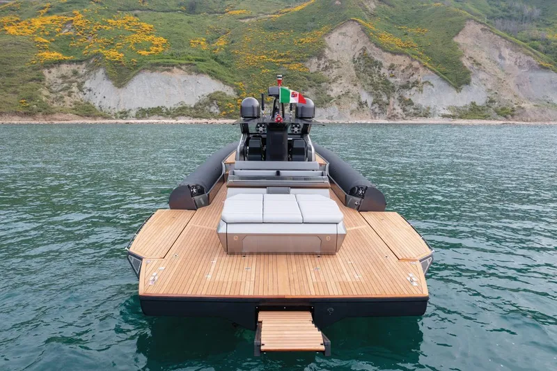 Slide: The Image of Anvera ANVERA 58 yacht, 2025 model, on serene water with scenic hillside backdrop. - 3