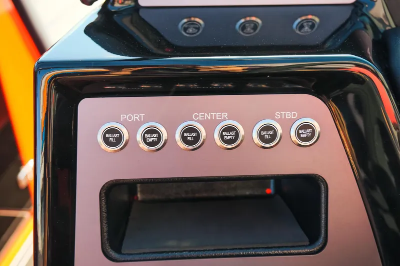 Slide: The Image of Control panel of 2025 MasterCraft NXT24 boat with ballast fill and empty buttons. - 20