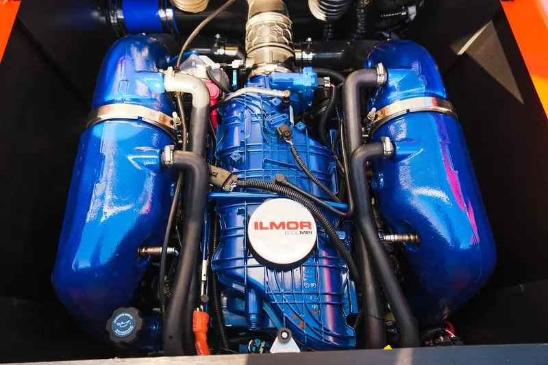 Slide: The Image of Engine of 2025 MasterCraft NXT24 boat, featuring Ilmor components, in vibrant blue. - 33