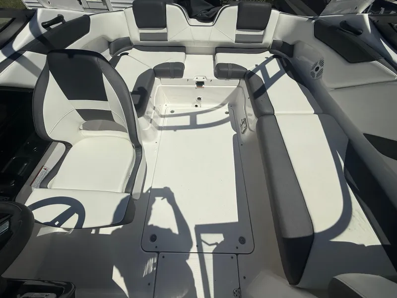 Slide: The Image of 2022 Yamaha AR210 boat interior with spacious seating and modern design. - 35