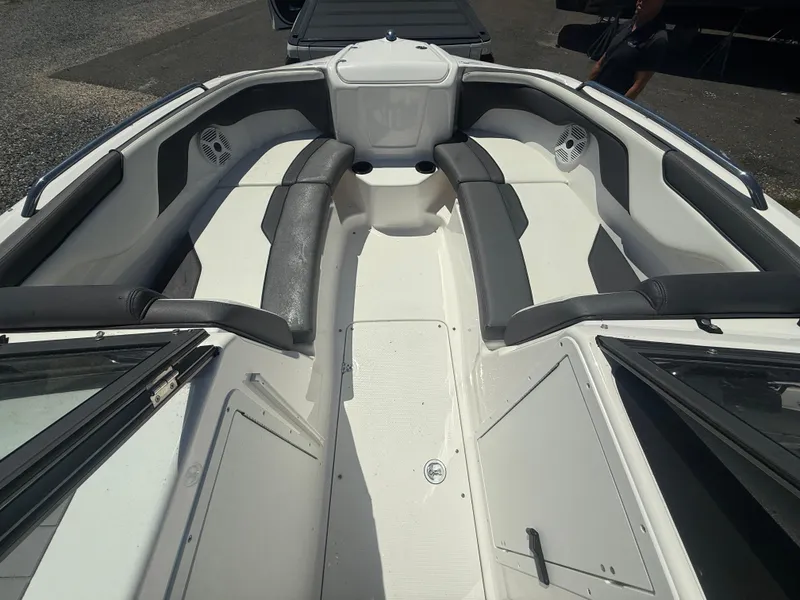 Slide: The Image of 2022 Yamaha Boats AR210 interior with sleek seating and modern design. - 37