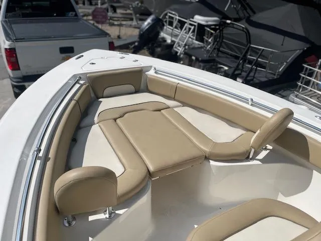 Slide: The Image of 2020 Key West 219 FS boat with beige seating and white deck. - 12
