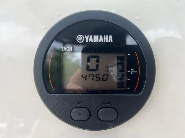 Slide: The Image of Yamaha tachometer displaying 475.0 hours on a 2020 Key West 219 FS boat. - 6