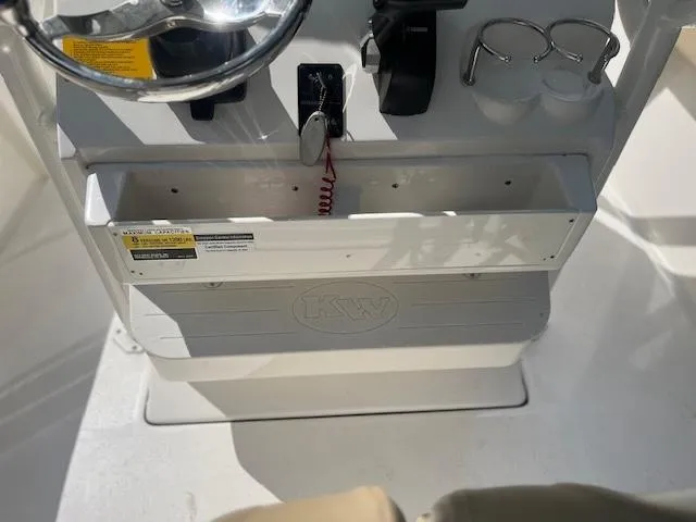 Slide: The Image of Center console of 2020 Key West 219 FS boat with steering wheel and controls. - 8