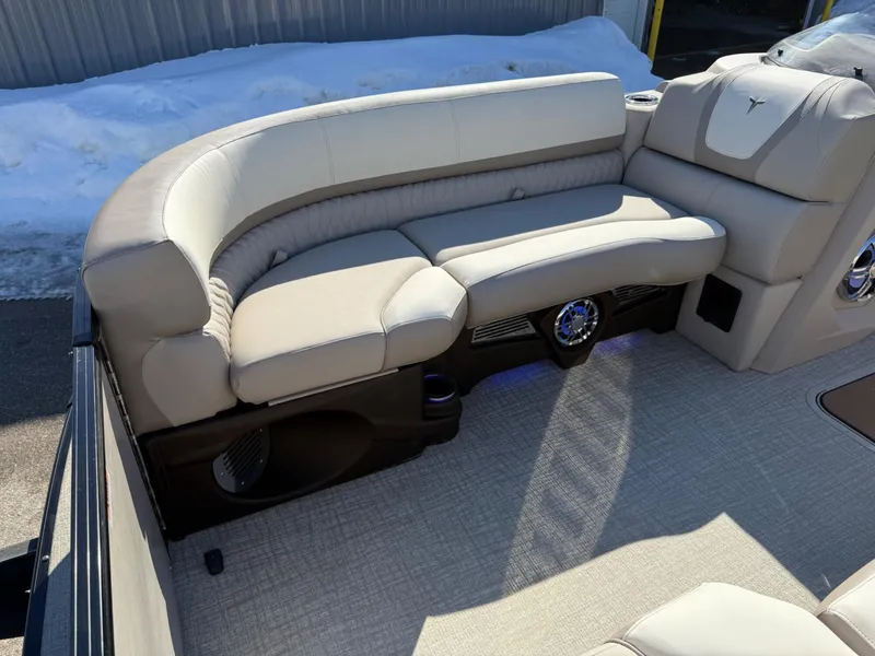 Slide: The Image of 2025 Tahoe Pontoon Cascade Versatile Rear Lounger with beige seating and modern design. - 13