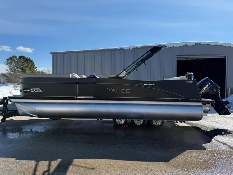 Slide: The Image of 2025 Tahoe Pontoon Cascade Versatile Rear Lounger, parked outdoors, side view. - 23