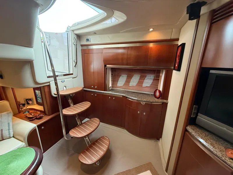 Slide: The Image of Luxurious interior of 2006 Sea Ray 52 Sundancer yacht with elegant wood finishes. - 11