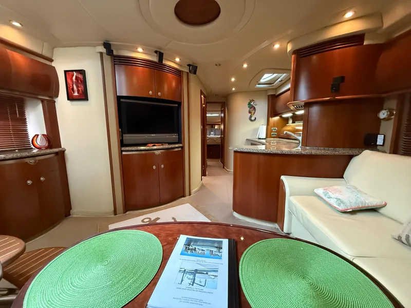 Slide: The Image of Luxurious interior of 2006 Sea Ray 52 Sundancer yacht with elegant wood finishes and modern amenities. - 12