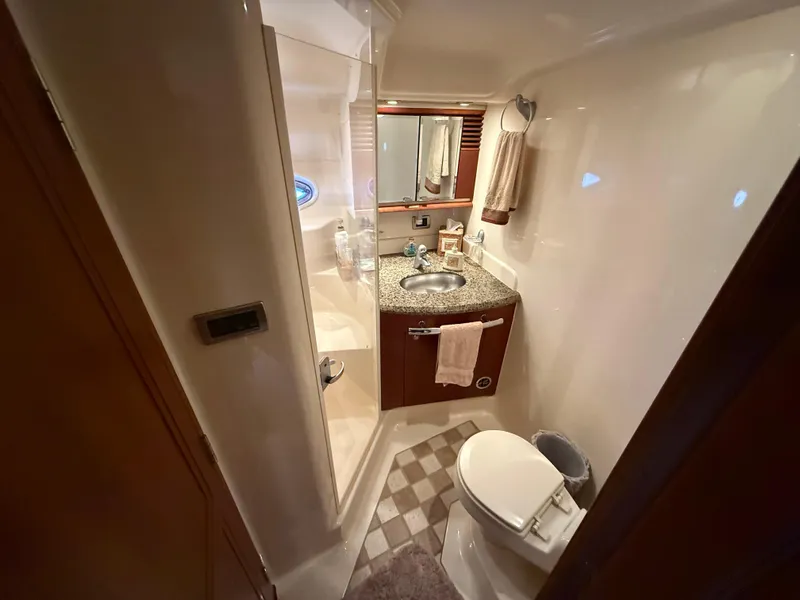 Slide: The Image of Luxurious bathroom in 2006 Sea Ray 52 Sundancer yacht with modern amenities. - 21