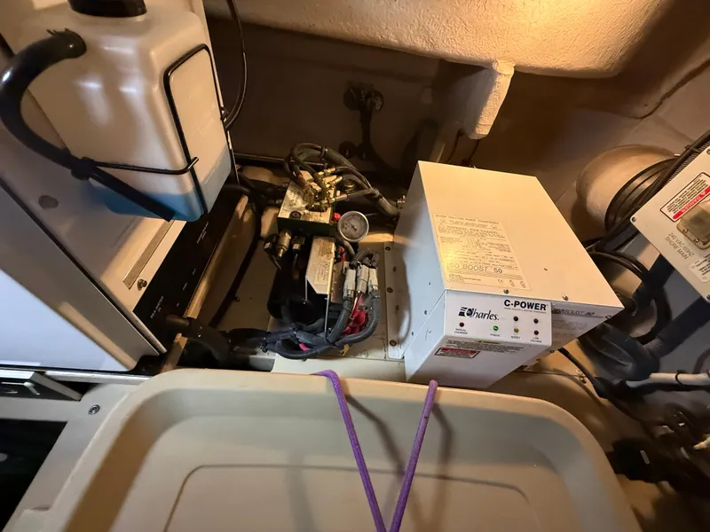 Slide: The Image of Engine room of a 2006 Sea Ray 52 Sundancer with generator and equipment. - 40