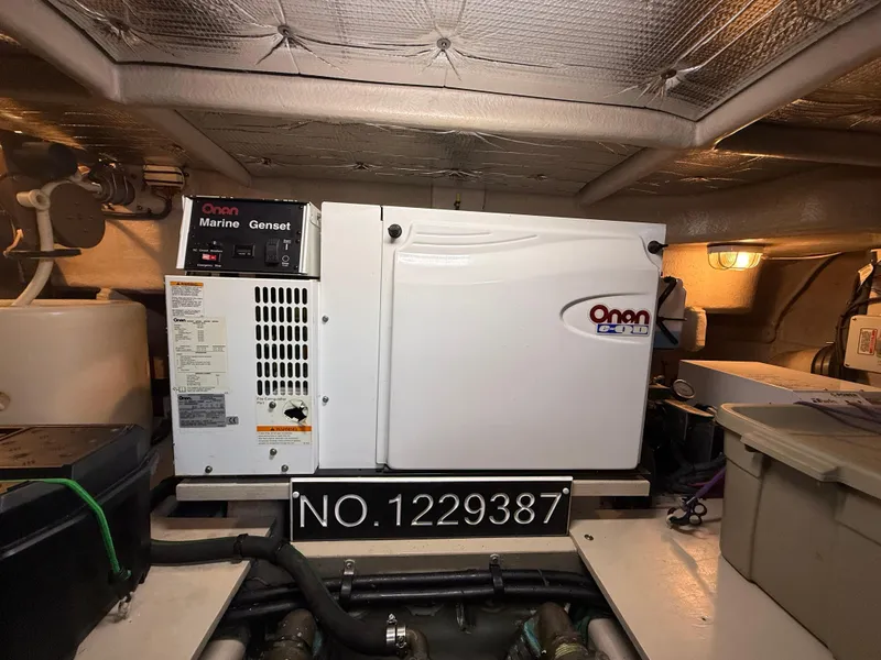 Slide: The Image of Engine room of 2006 Sea Ray 52 Sundancer with Onan marine generator. - 41