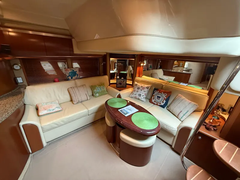 Slide: The Image of Luxurious interior of a 2006 Sea Ray 52 Sundancer yacht with elegant seating and decor. - 9