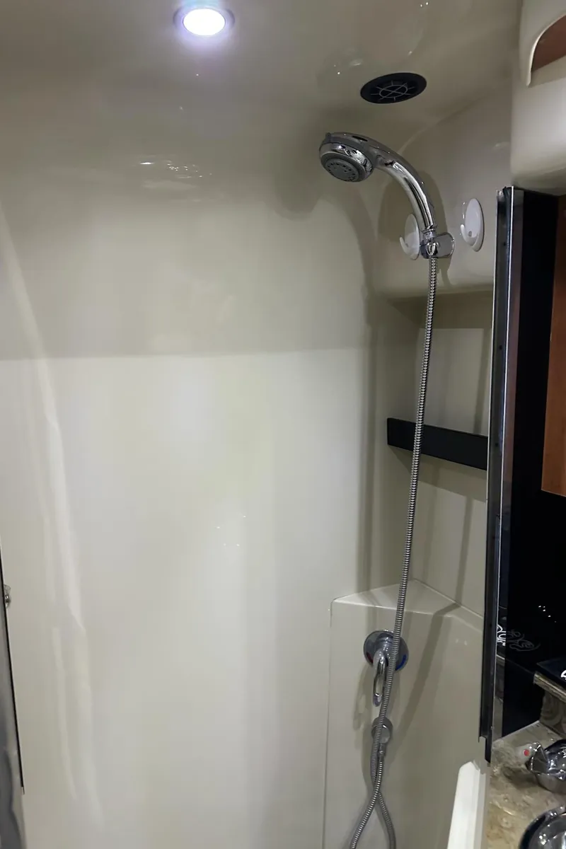 Slide: The Image of 2008 Cruisers Yachts 360 Express shower area with modern fixtures and lighting. - 19