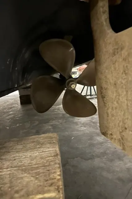 Slide: The Image of 2008 Cruisers Yachts 360 Express propeller and rudder detail in dry dock. - 24