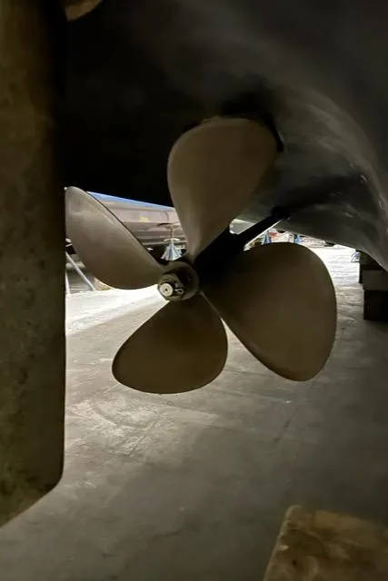 Slide: The Image of Propeller of 2008 Cruisers Yachts 360 Express, close-up view in a boatyard. - 25