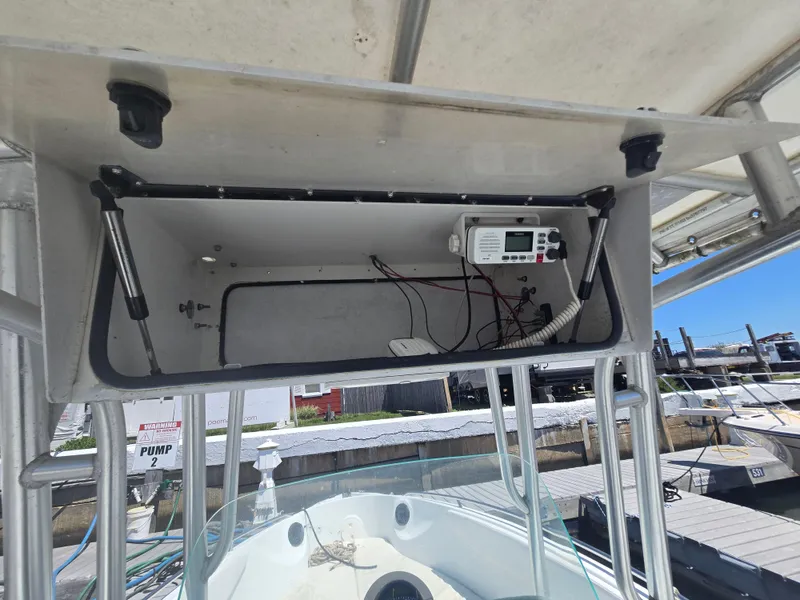 Slide: The Image of 2004 Baja 250 Sportfish boat console with radio equipment and wiring. - 7