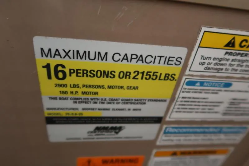 Slide: The Image of Maximum capacity label on 2008 Godfrey SAN PAN 2500 RE boat, 16 persons or 2155 lbs. - 12