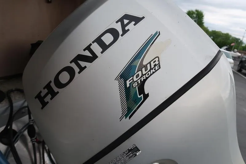 Slide: The Image of Honda four-stroke engine on 2008 Godfrey SAN PAN 2500 RE boat. - 3