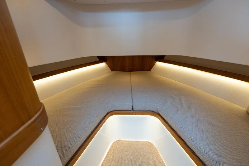 Slide: The Image of 2025 Targa 32 GT cabin interior with cozy lighting and modern design. - 41