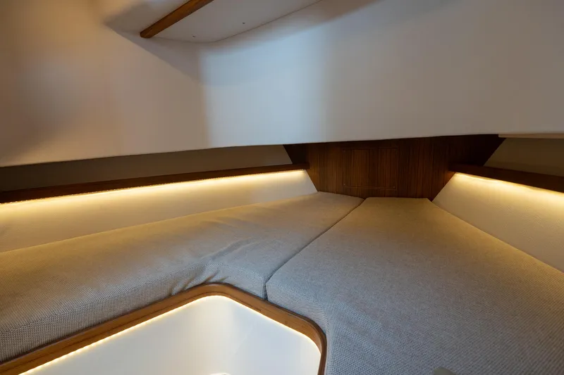 Slide: The Image of Interior cabin of 2025 Targa 32 GT boat with cozy lighting and modern design. - 42