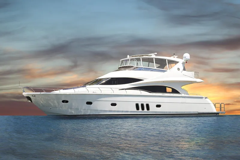 The Image of 2007 Marquis 65 yacht on calm water at sunset. - 1