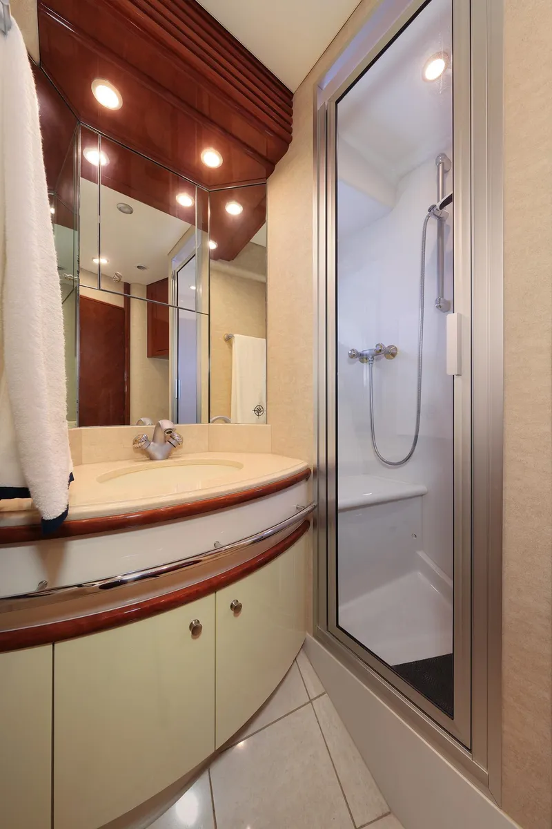 Slide: The Image of Luxurious bathroom in 2007 Marquis 65 yacht with modern shower and elegant vanity. - 19