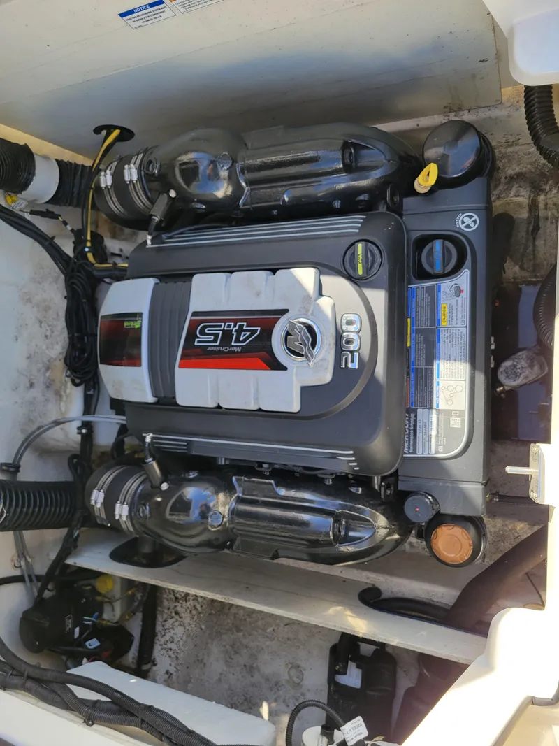 Slide: The Image of 2019 Bayliner VR6 Bowrider I/O engine compartment with 4.5L 200 HP motor. - 37