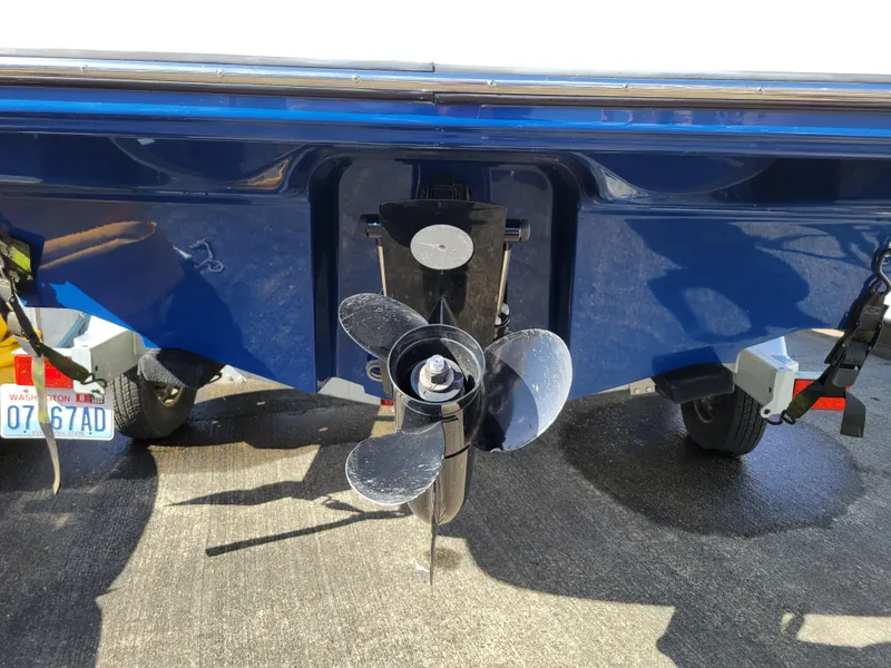 Slide: The Image of 2019 Bayliner VR6 Bowrider I/O boat propeller and stern view. - 40