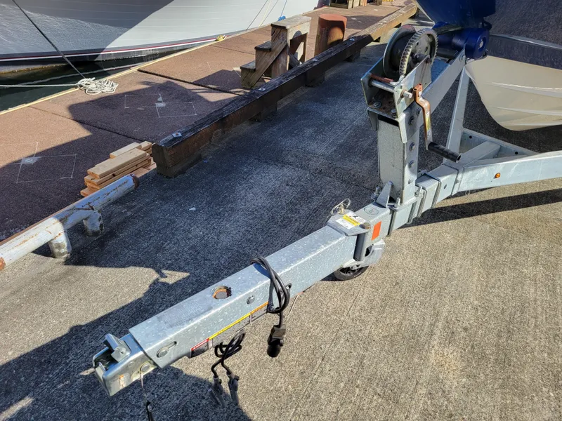 Slide: The Image of Trailer hitch of a 2019 Bayliner VR6 Bowrider I/O on concrete surface. - 42