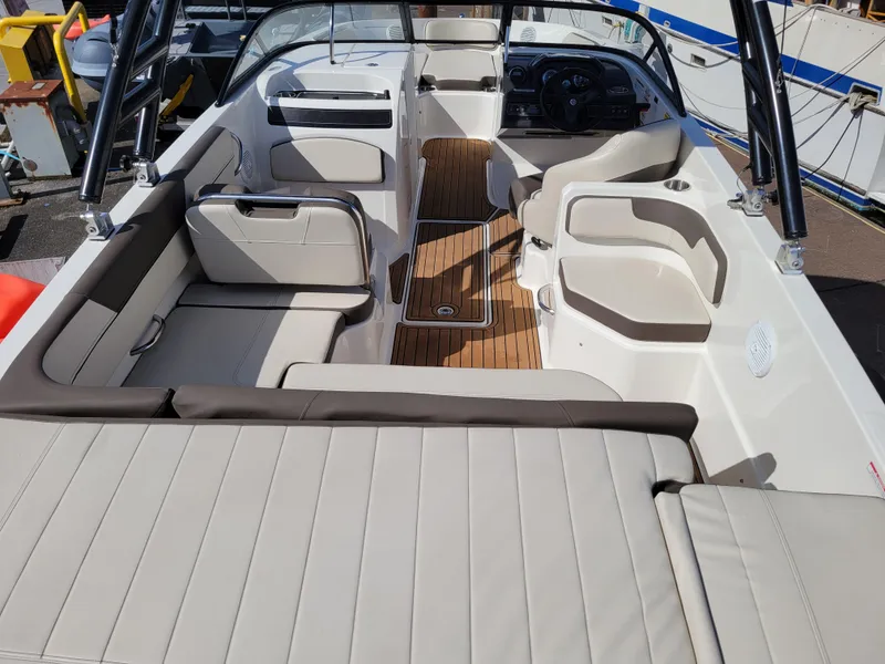 Slide: The Image of 2019 Bayliner VR6 Bowrider I/O interior with spacious seating and sleek design. - 7