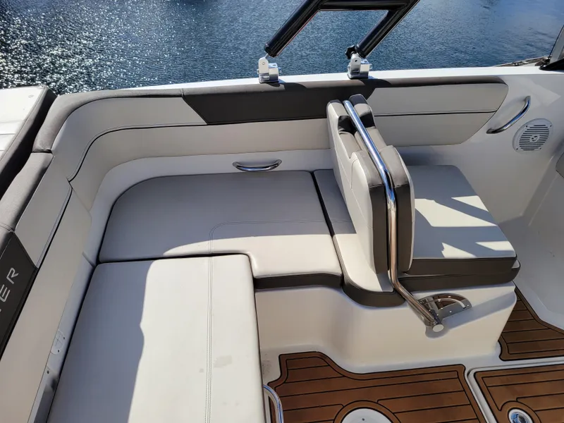 Slide: The Image of 2019 Bayliner VR6 Bowrider I/O interior seating with water view. - 9