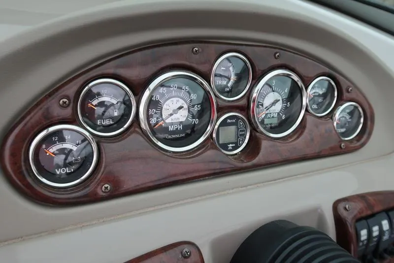 Slide: The Image of Dashboard of 2008 Crownline 21LS boat with speedometer and fuel gauges. - 14