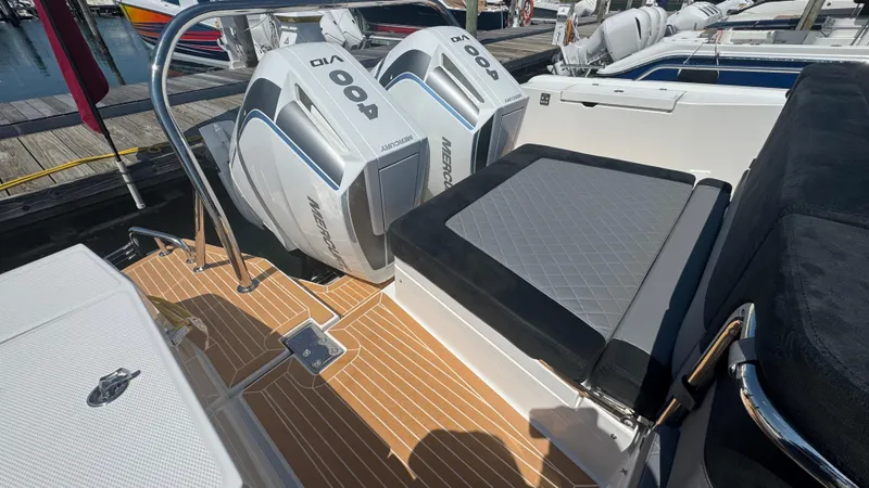 Slide: The Image of Luxury Nimbus T11 boat with dual Mercury outboard engines, 2025 model. - 11