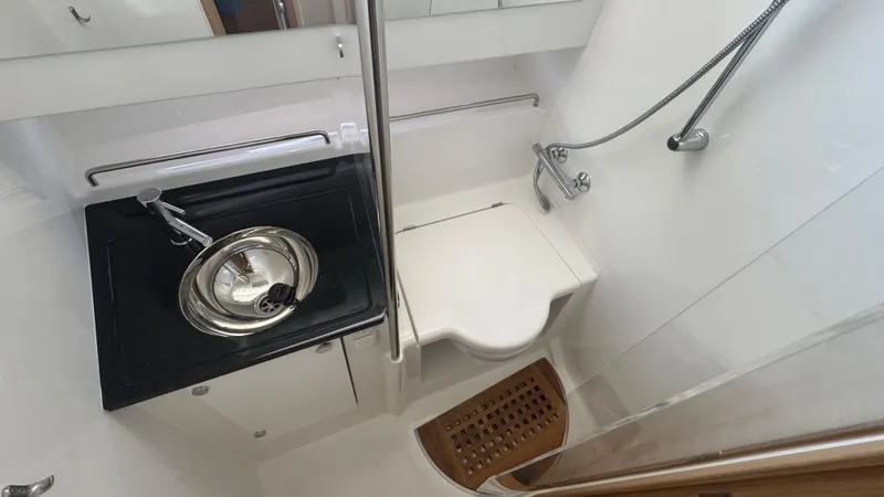 Slide: The Image of Compact bathroom in 2025 Nimbus T11 boat with sink, toilet, and shower. - 39