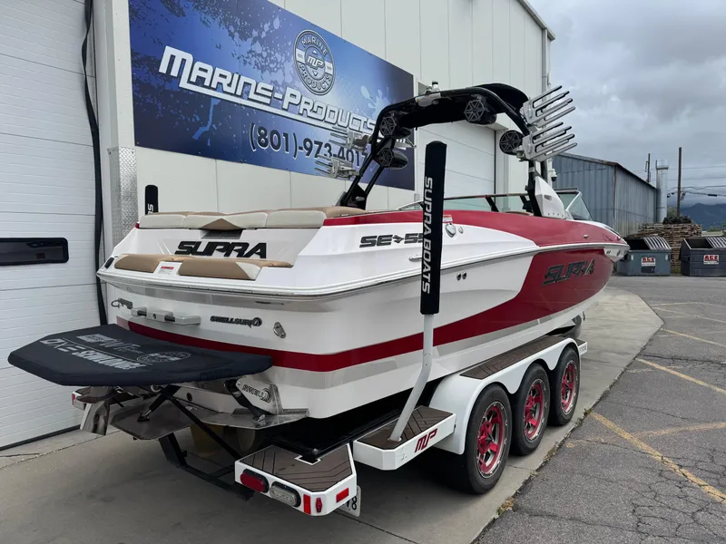 Slide: The Image of 2017 Supra SE 550 boat on trailer at Marine Products facility. - 3