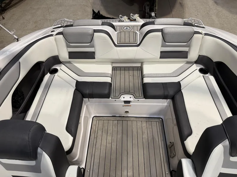 Slide: The Image of 2020 Yamaha Boats 212 interior with sleek seating and modern design. - 8