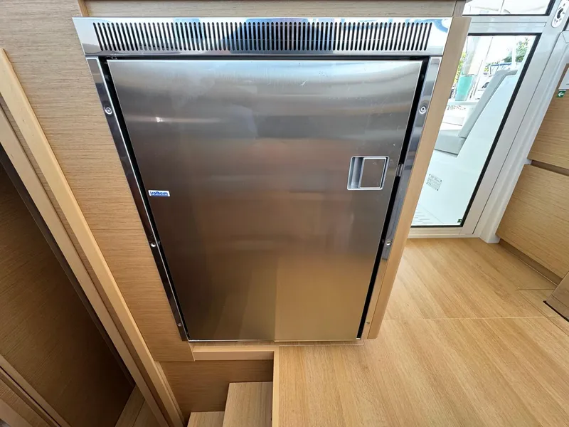 Slide: The Image of Stainless steel refrigerator in 2023 Excess 12 yacht interior. - 35