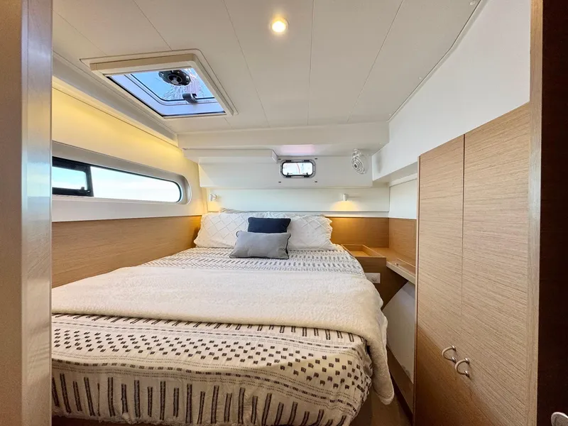 Slide: The Image of Luxurious cabin interior of 2023 Excess 12 yacht with cozy bed and modern design. - 38