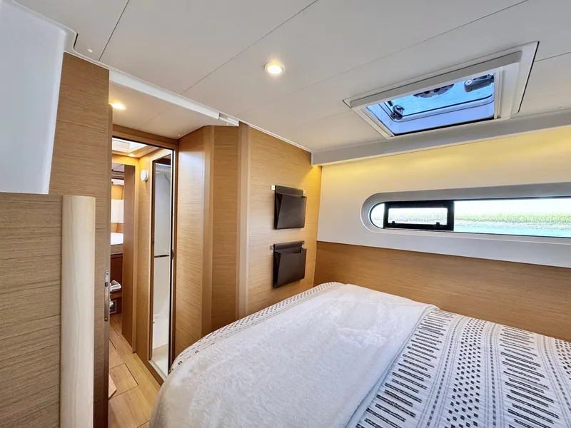 Slide: The Image of Luxurious cabin interior of 2023 Excess 12 yacht with skylight and modern design. - 41