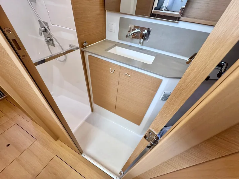 Slide: The Image of Modern bathroom in 2023 Excess 12 yacht with sleek wood cabinetry and compact design. - 44