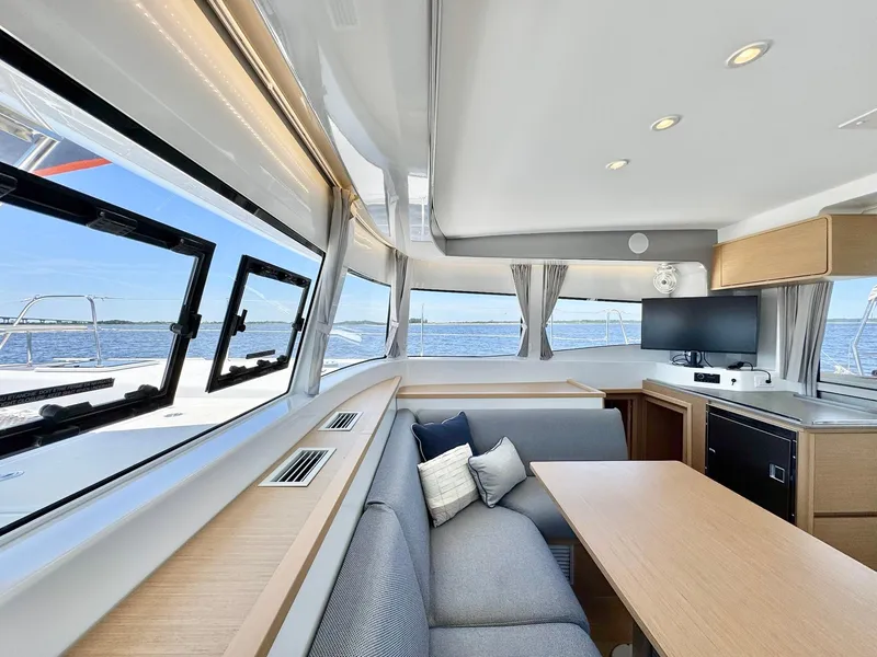 Slide: The Image of Luxurious interior of 2023 Excess 12 yacht with panoramic windows and modern furnishings. - 8