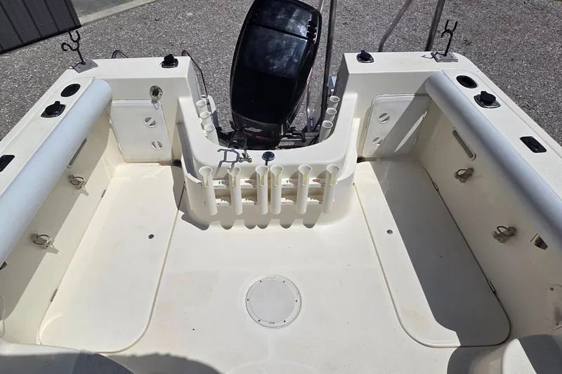 Slide: The Image of 2007 Trophy 2002 Walkaround boat interior with seating and storage compartments. - 15