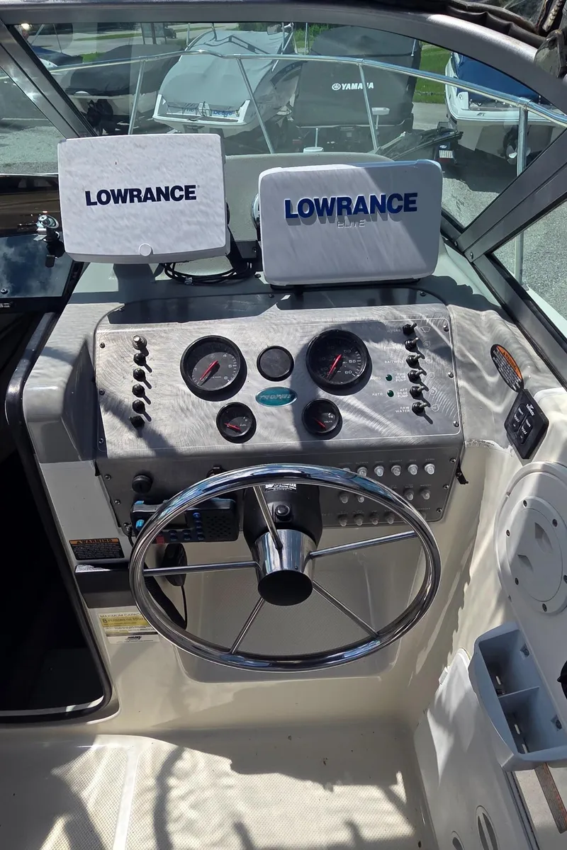 Slide: The Image of 2007 Trophy 2002 Walkaround boat dashboard with Lowrance navigation systems. - 7